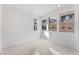 Spacious bedroom with large windows and light-colored carpeting at 655 Spotted Falcon St, Las Vegas, NV 89138