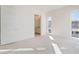Spacious bedroom with large windows and plush carpeting at 655 Spotted Falcon St, Las Vegas, NV 89138