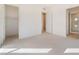Bright bedroom with carpet flooring and ensuite bathroom at 655 Spotted Falcon St, Las Vegas, NV 89138