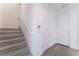 Bright entryway with stairs and a door leading to the interior at 655 Spotted Falcon St, Las Vegas, NV 89138