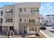 Modern three-story townhome with a two-car garage and private balcony at 655 Spotted Falcon St, Las Vegas, NV 89138