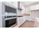 Modern kitchen with stainless steel appliances and white shaker cabinets at 655 Spotted Falcon St, Las Vegas, NV 89138