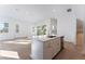 Modern kitchen with a large island and stainless steel appliances at 655 Spotted Falcon St, Las Vegas, NV 89138