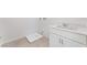 Convenient laundry room with a sink and white cabinets at 655 Spotted Falcon St, Las Vegas, NV 89138