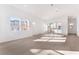 Sunlit living room featuring hardwood floors and large windows at 655 Spotted Falcon St, Las Vegas, NV 89138