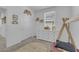 bedroom showcases a white dresser, wooden teepee bed frame and a window with blinds at 734 Last Dance Pl, Henderson, NV 89011