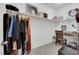 Walk in closet featuring built in storage shelves, rack and desk area at 734 Last Dance Pl, Henderson, NV 89011