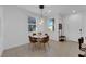 Cozy dining area with modern pendant lighting and seating for four at 734 Last Dance Pl, Henderson, NV 89011