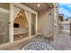 Charming patio with sliding glass doors, stylish seating, and brick flooring, ideal for outdoor living at 734 Last Dance Pl, Henderson, NV 89011