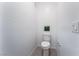Small half bathroom with toilet and pedestal sink at 2555 Hampton Rd # 4308, Henderson, NV 89052
