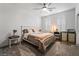 Bedroom with ceiling fan, carpet, and built-in desk at 2555 Hampton Rd # 4308, Henderson, NV 89052
