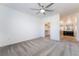 Bedroom with ceiling fan, walk-in closet, and ensuite bathroom access at 2555 Hampton Rd # 4308, Henderson, NV 89052