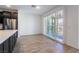 Bright dining area with sliding glass doors leading to a balcony at 2555 Hampton Rd # 4308, Henderson, NV 89052