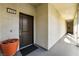 Building entryway with private access and potted plant at 2555 Hampton Rd # 4308, Henderson, NV 89052
