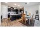 Open concept kitchen with island and dining area at 2555 Hampton Rd # 4308, Henderson, NV 89052