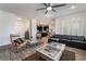 Modern living room with comfy seating, coffee table, and hardwood floors at 2555 Hampton Rd # 4308, Henderson, NV 89052