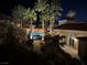 Night view of the community pool and landscaping at 2555 Hampton Rd # 4308, Henderson, NV 89052