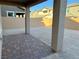 Covered patio with brick pavers and view of the backyard at 5072 Dule Grove St, Las Vegas, NV 89130