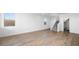Spacious living area with hardwood floors and plenty of natural light at 657 N Water St, Henderson, NV 89015