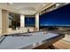 Game room featuring a pool table and expansive windows with panoramic city views at 1492 Macdonald Ranch Dr, Henderson, NV 89012