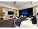 Luxurious main bedroom with fireplace and panoramic city views at 1492 Macdonald Ranch Dr, Henderson, NV 89012