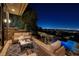 Outdoor patio with comfortable seating and beautiful city views at 1492 Macdonald Ranch Dr, Henderson, NV 89012