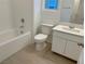 Clean bathroom with tub, toilet and vanity at 568 Celebratory Pl, Henderson, NV 89011