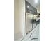 Kitchen with a stainless steel refrigerator and sleek black cabinets at 6745 Keren Marie Ave, Las Vegas, NV 89110