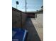Long backyard with cinderblock fence and concrete at 1929 Evelyn Ave, Henderson, NV 89011