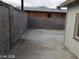 Backyard featuring a cinderblock fence with concrete at 1929 Evelyn Ave, Henderson, NV 89011