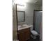 Standard bathroom with vanity, toilet, and glass enclosed shower stall at 1929 Evelyn Ave, Henderson, NV 89011