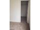 Neutral carpeted bedroom with white trim, baseboards, and closet at 1929 Evelyn Ave, Henderson, NV 89011