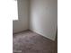 Bedroom with stained carpet at 1929 Evelyn Ave, Henderson, NV 89011