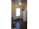 The kitchen has a door, refrigerator, and gas stove at 1929 Evelyn Ave, Henderson, NV 89011