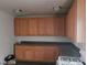 Bright kitchen featuring oak cabinets and adequate counter space for meal preparation at 1929 Evelyn Ave, Henderson, NV 89011