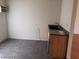 Small kitchen with a sink at 1929 Evelyn Ave, Henderson, NV 89011