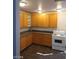 Bright kitchen featuring wood cabinets and modern appliances at 1929 Evelyn Ave, Henderson, NV 89011