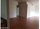 Open living area with hardwood floors at 1929 Evelyn Ave, Henderson, NV 89011