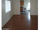 View of the open-concept living room and kitchen space at 1929 Evelyn Ave, Henderson, NV 89011