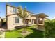 Home's backyard features a pergola, artificial turf, and a spacious patio at 10137 Skye Saddle Ave, Las Vegas, NV 89166