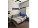 Bright bedroom featuring decorations above the bed with a window that lets in natural light at 2305 W Horizon Ridge Pkwy # 3512, Henderson, NV 89052