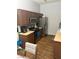 Well-equipped kitchen features stainless steel appliances, brown cabinets, and a complementing countertop at 2305 W Horizon Ridge Pkwy # 3512, Henderson, NV 89052