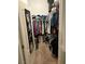 Organized walk-in closet with ample hanging space and shelving for storage at 2305 W Horizon Ridge Pkwy # 3512, Henderson, NV 89052