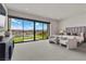 Bright bedroom with sliding glass doors opening to a stunning view at 21 Canyon Bay Dr, Henderson, NV 89011