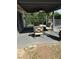 Cozy covered back patio with comfortable seating and shade at 3909 Woodhill Ave, Las Vegas, NV 89121