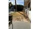 Spacious backyard featuring a pool, grassy area, and mature trees at 3909 Woodhill Ave, Las Vegas, NV 89121