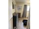 Bedroom with dark dresser, wood-look flooring, and a calming, minimalist decor at 3909 Woodhill Ave, Las Vegas, NV 89121