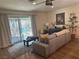 Spacious living room with a backyard pool view, blending indoor and outdoor living at 3909 Woodhill Ave, Las Vegas, NV 89121