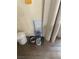 Dedicated pet area with water dispenser, food bowl, and storage in a clean corner at 3909 Woodhill Ave, Las Vegas, NV 89121
