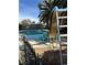 Inviting swimming pool with a slide and surrounding landscaping at 3909 Woodhill Ave, Las Vegas, NV 89121